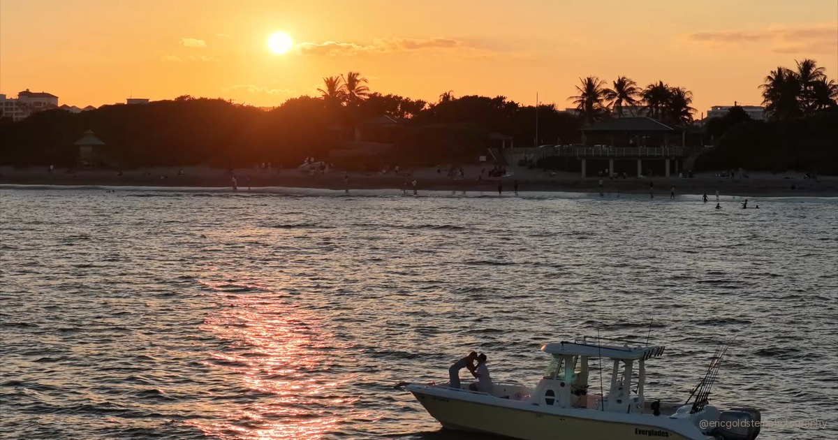 Engagement photo at Fort Lauderdale Beach, couple at golden hour