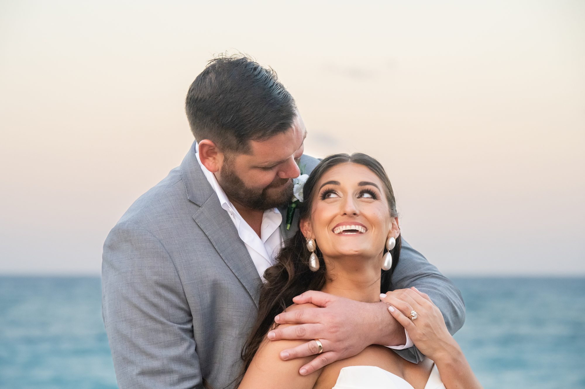 Couple relaxing together and reviewing wedding plans without stress