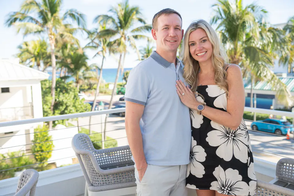 Engaged couple balcony Palm Beach