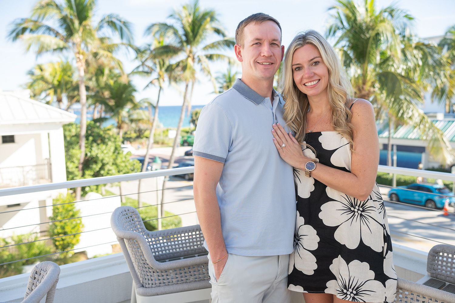 Engaged couple balcony Palm Beach